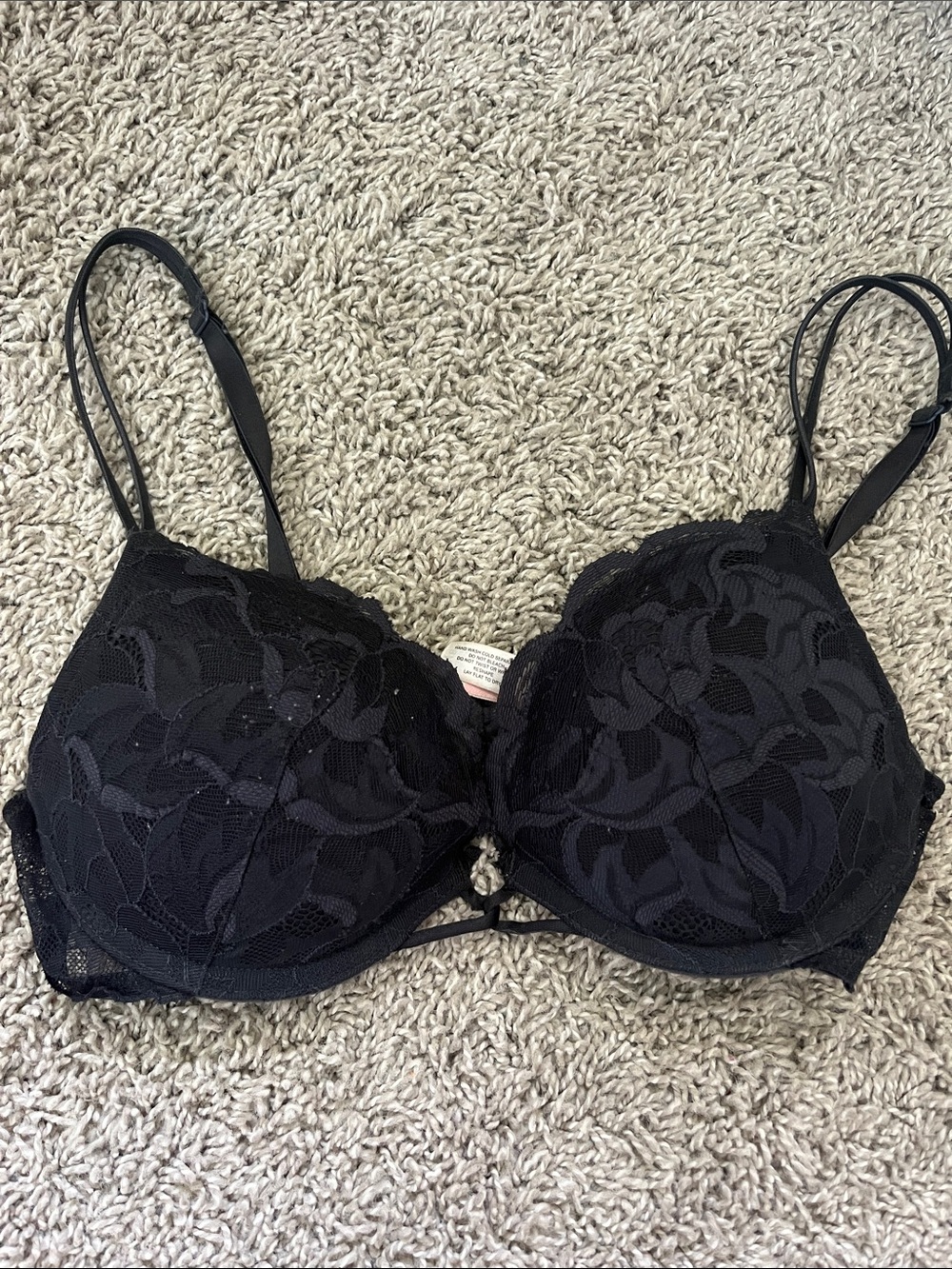 Women's Black Lace Underwire Bra with Floral Overlay that is a push up bra